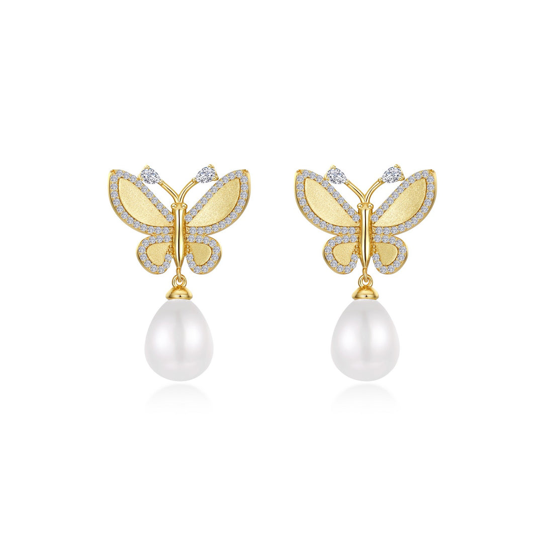 statement butterfly with cultured freshwater pearl drop earrings