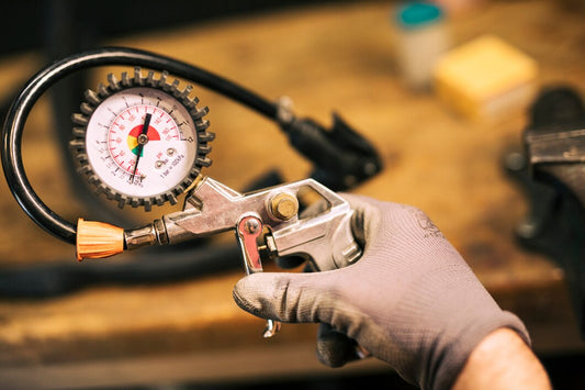 mechanic-repairing-bicycle_23-2148138445